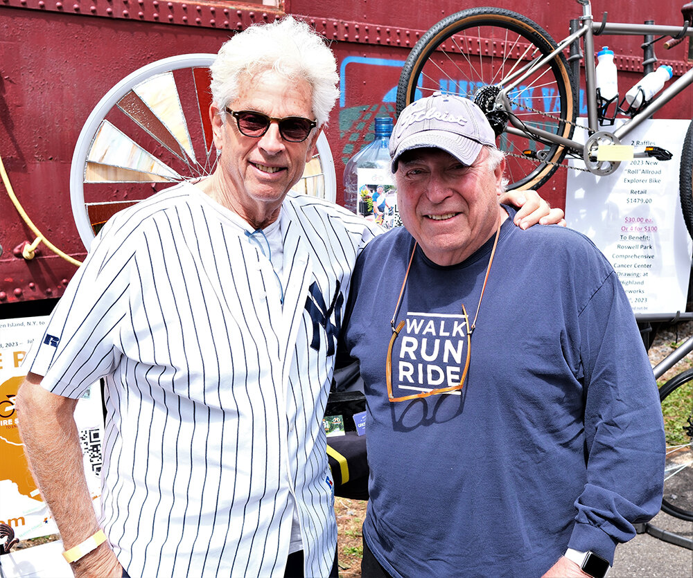 Walkway Board member and chairman of the Amenities Committee John Storyk [L] and fellow board member Howard Schwartz attended this year’s Mayfest